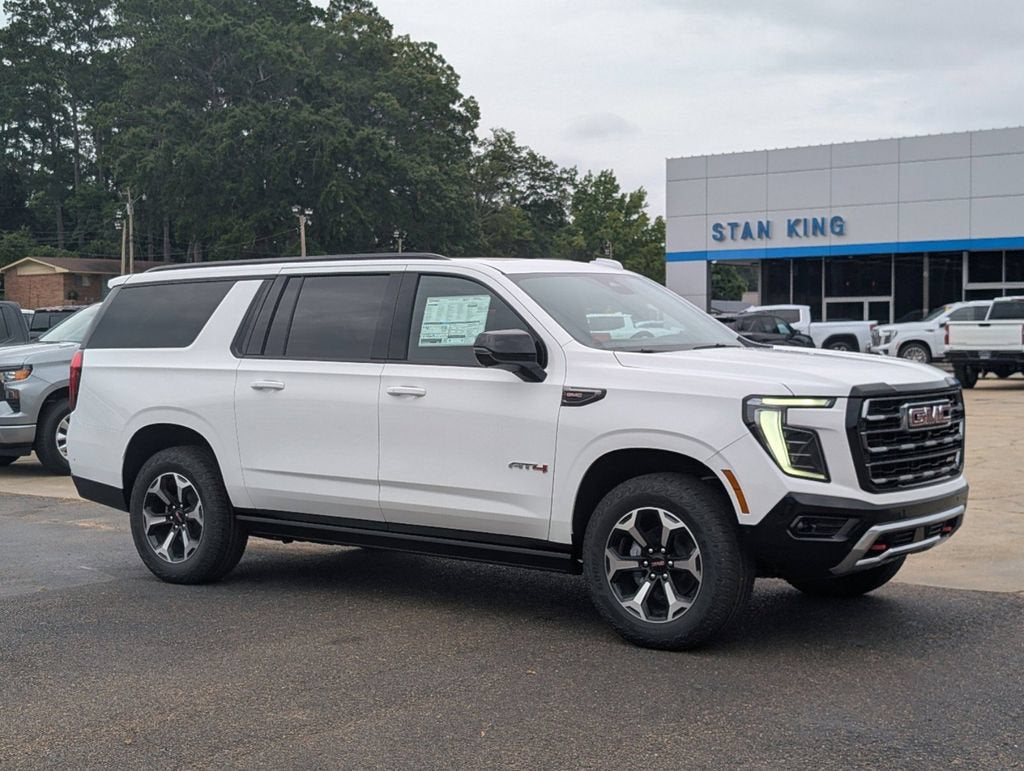 2026 GMC Yukon XL AT4 in Summit White — front three-quarter view