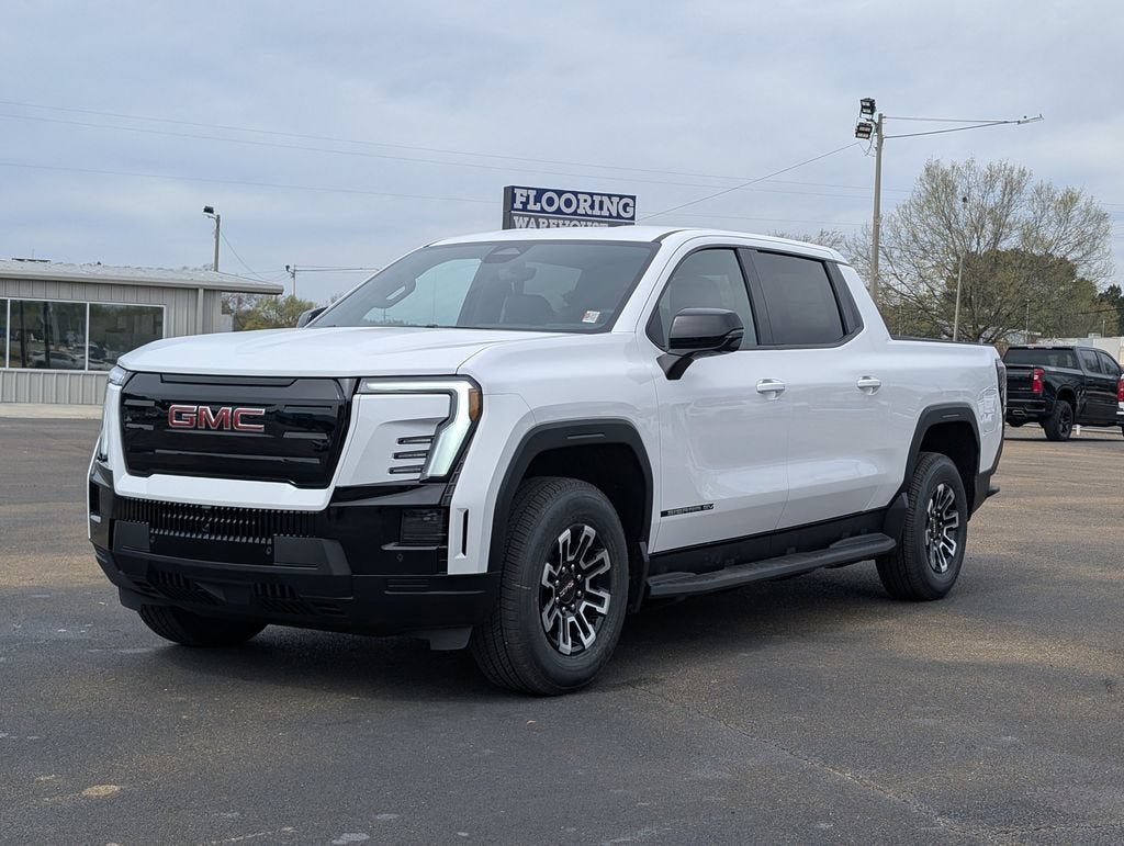 2026 GMC Sierra EV Elevation Extended Range in Summit White — front three-quarter view