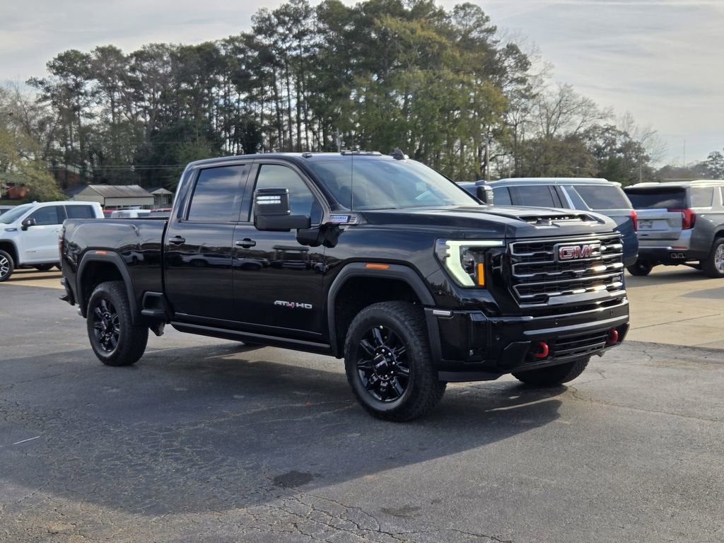 2026 GMC Sierra 2500 HD AT4 in Onyx Black — front three-quarter view