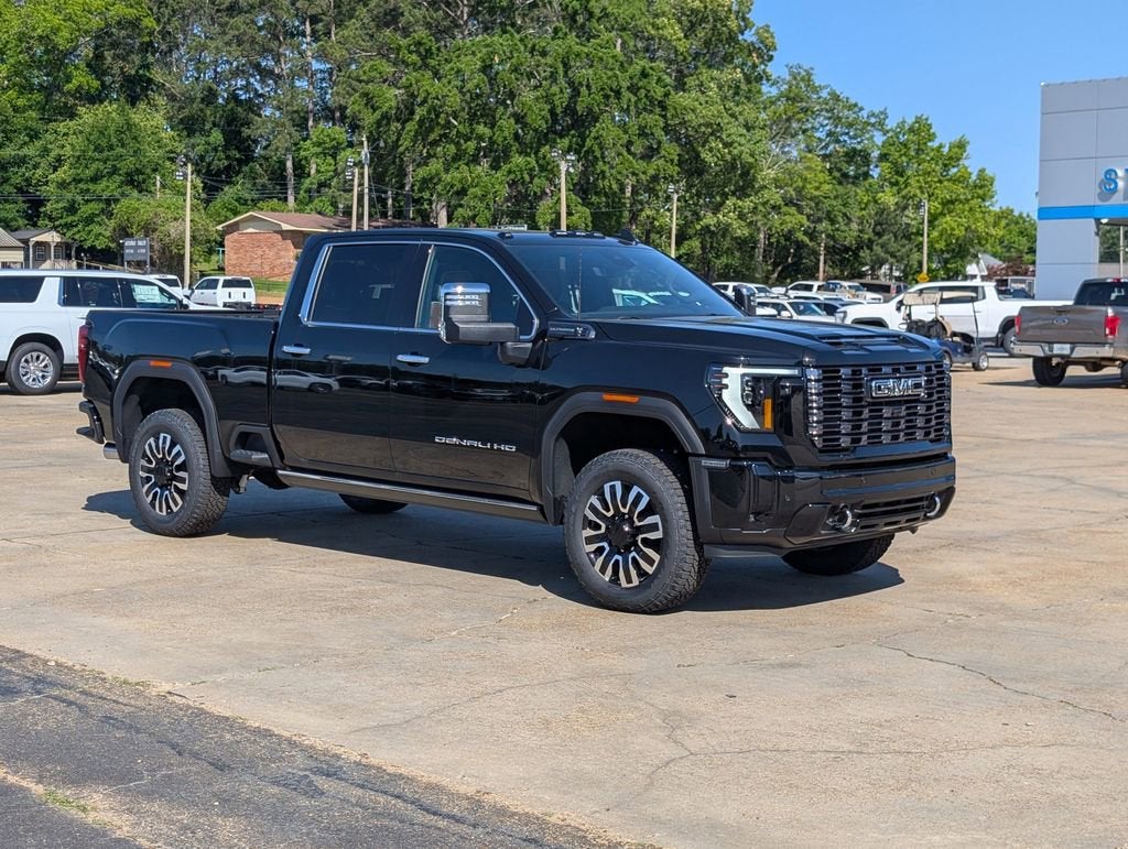 2026 GMC Sierra 2500 HD Denali Ultimate in Onyx Black — front three-quarter view