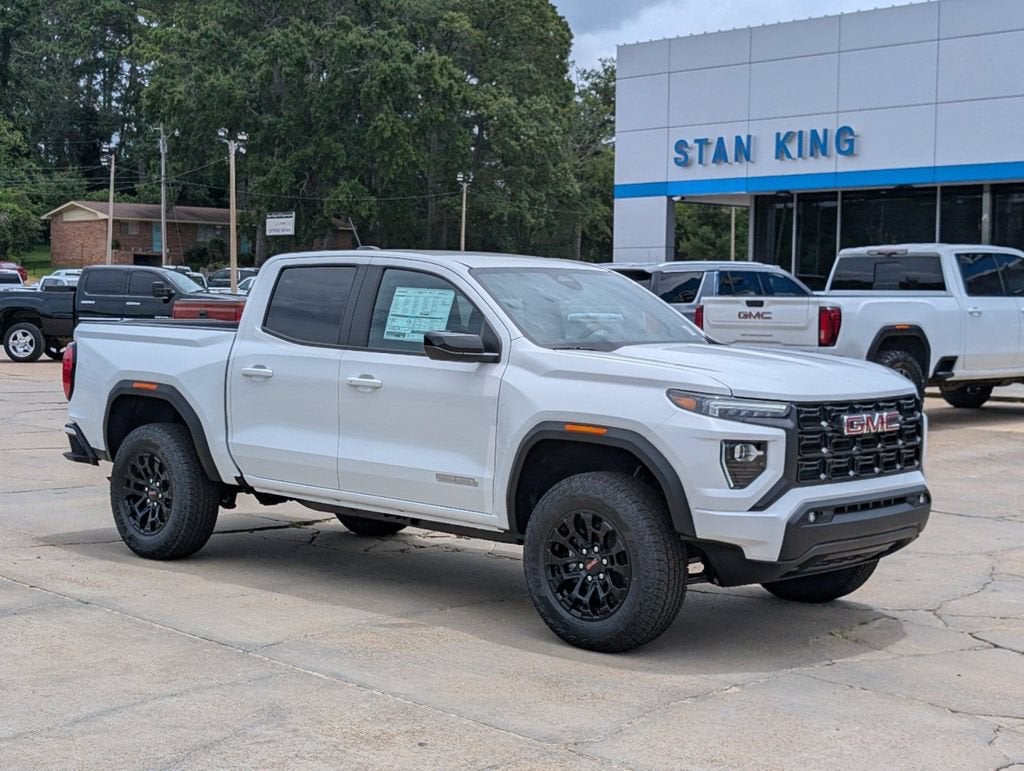 2026 GMC Canyon Elevation in Summit White — front three-quarter view