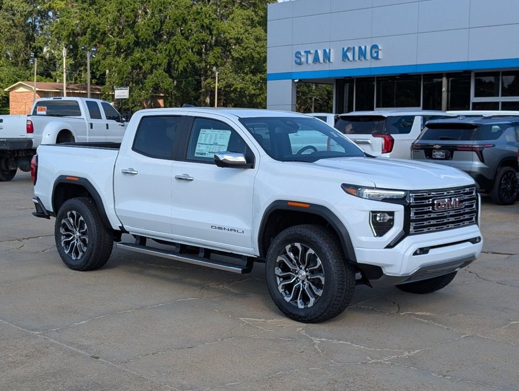 2026 GMC Canyon Denali in Summit White — front three-quarter view