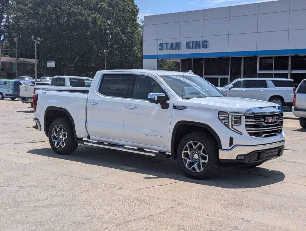 2026 GMC Sierra 1500 SLT in Summit White — front three-quarter view