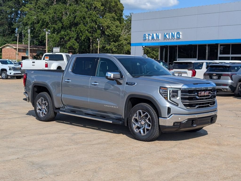 2026 GMC Sierra 1500 SLT in Sterling Metallic — front three-quarter view