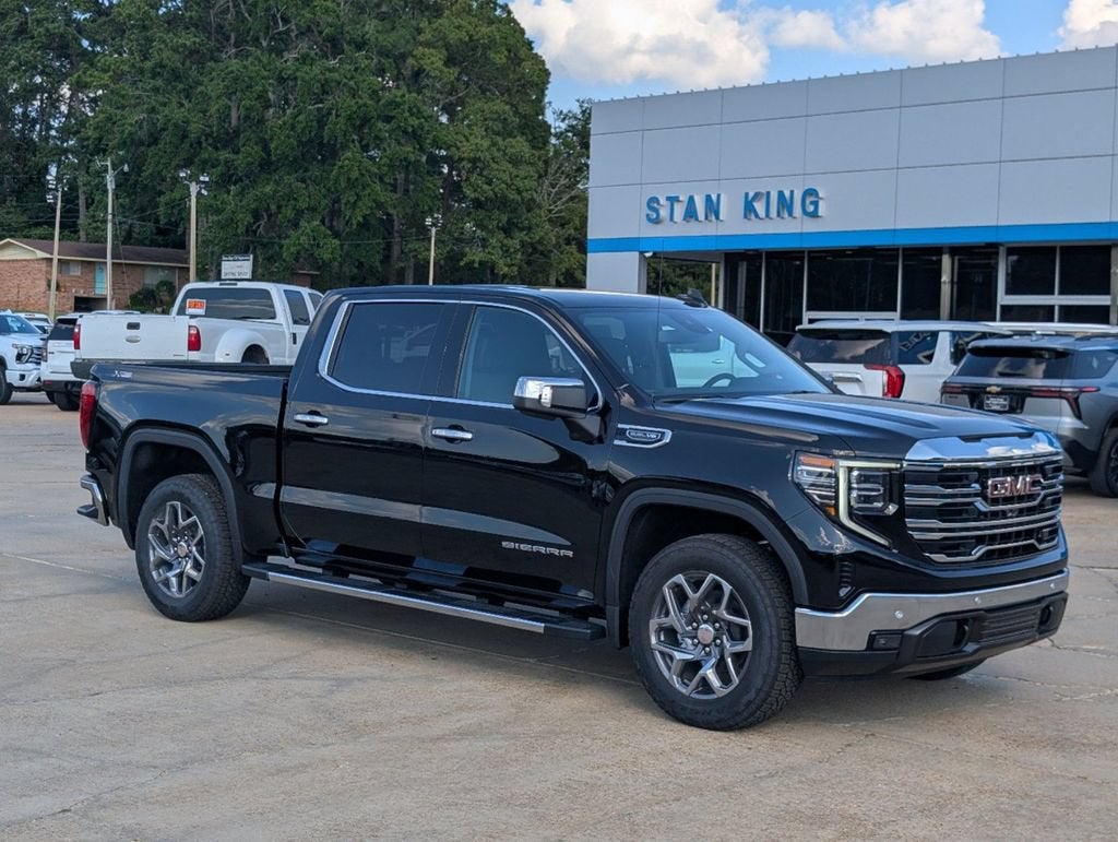 2026 GMC Sierra 1500 SLT in Onyx Black — front three-quarter view